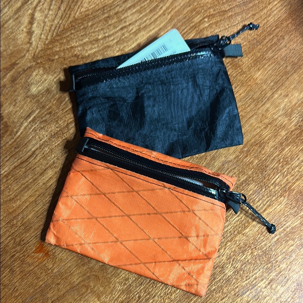 Two dyneema ultralight wallets for backpacking other adventures.